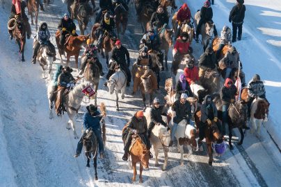 Dakota 38+2 Wokiksuye riders finish the last stretch of their 330-mile ride along Riverfront Avenue in Mankato on their way to Reconciliation Park in 2022.